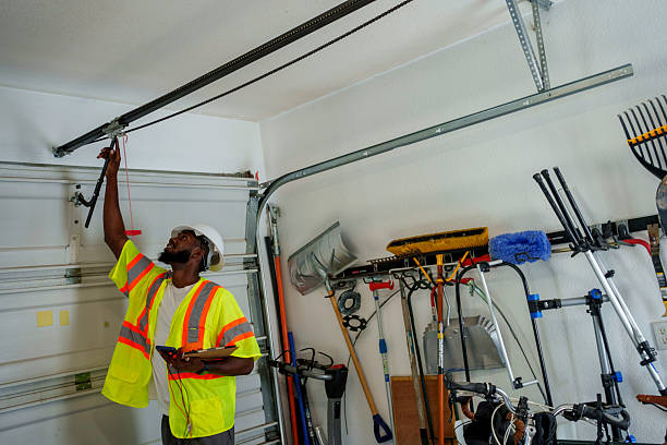 Professional Garage Door Maintenance technician working in Garden City, NY